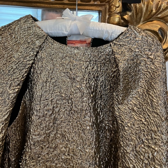 Great dress look so runway. Has tag on and I wore it to a disco Gala. $150 - Picture 5 of 7